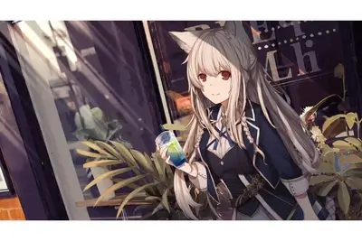 Girl with cat ears drinking a blue drink