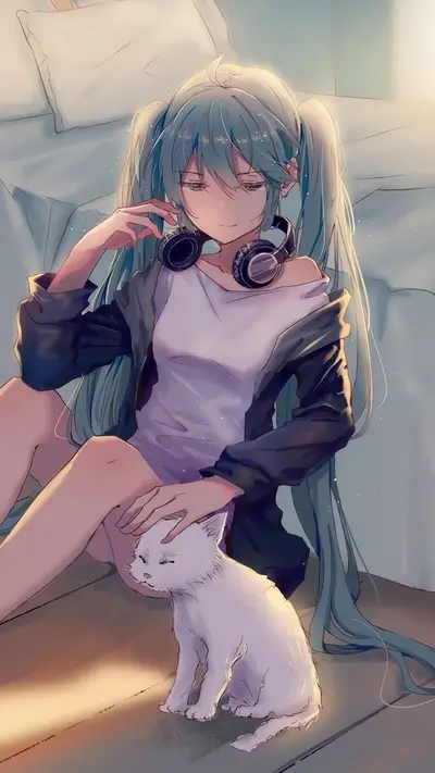 Girl with headphones and a cat