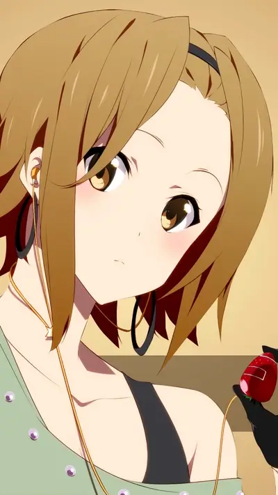 Girl with headphones and strawberry