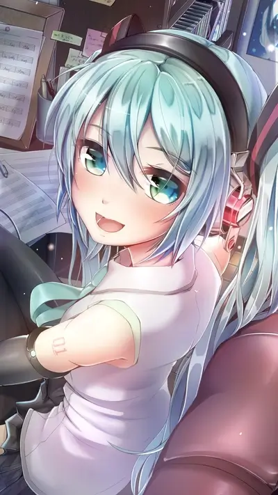 Girl with headphones at a music desk