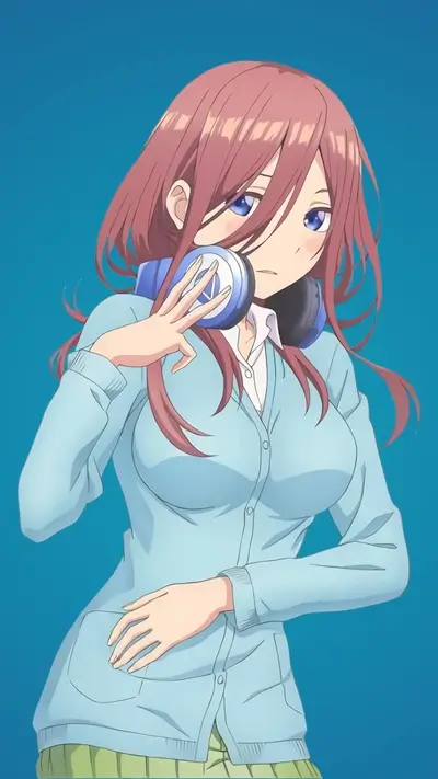 Girl with headphones, light blue cardigan