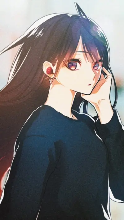 Girl with long dark hair, red earrings, dark shirt