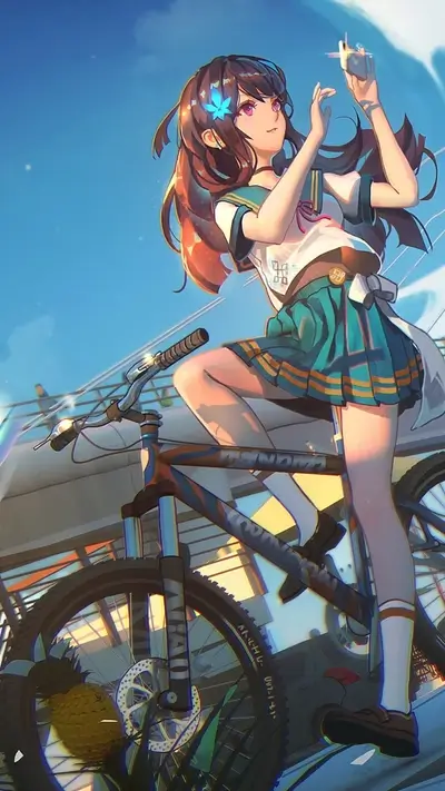 Girl with phone on a bike