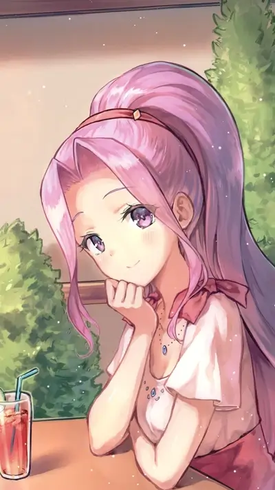Girl with pink hair sitting at a table