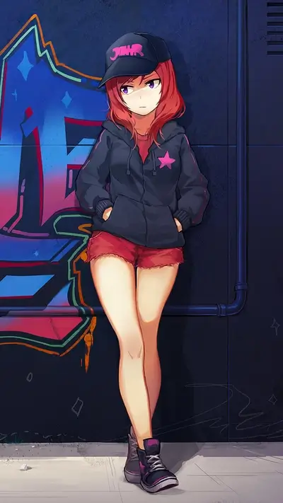 Girl with red hair leaning against a graffiti wall