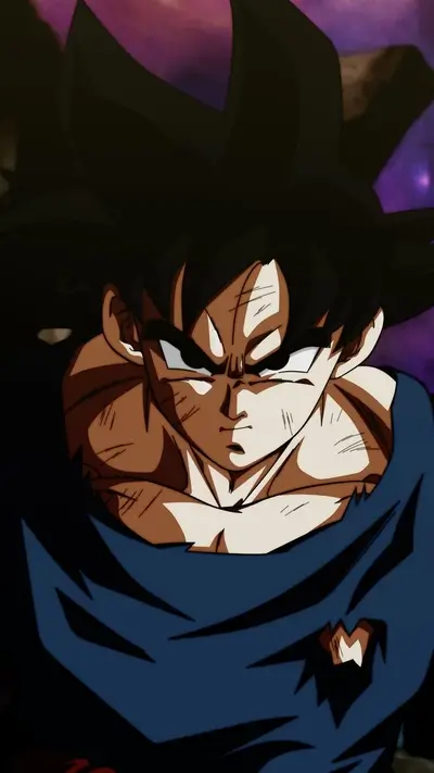 Goku, battle-scarred, intense expression