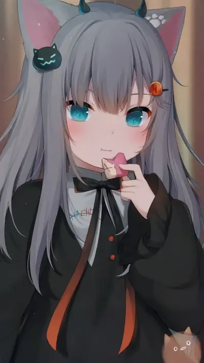 Gray-haired girl with cat ears eating a snack