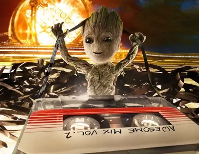 Groot holding a cassette tape