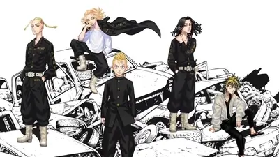 Group of boys posing on a pile of wrecked cars
