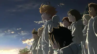 Group of children standing together looking towards the sunrise