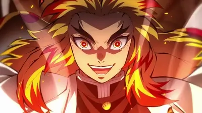 Intense close-up portrait of Rengoku with fiery hair and bright eyes