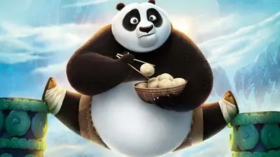 Kung Fu Panda's Po sitting with dumplings
