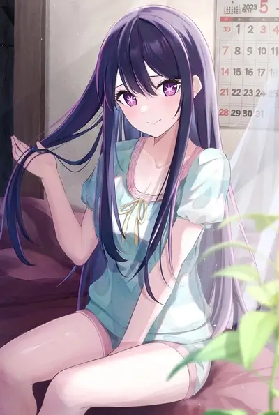 Long-haired girl wearing pajamas in bed