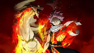 Natsu dragneel engulfed in bright flames alongside a fire dragon