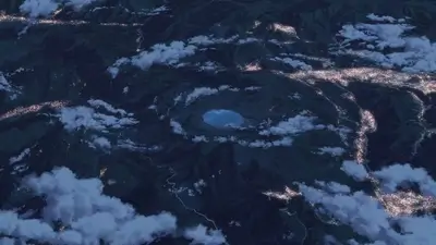 Night view of a mountainous region with a lake