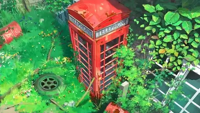 Overgrown telephone booth amidst lush vegetation and debris