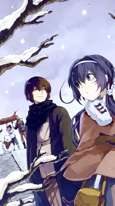 People enjoying snowy day, building snowman, warmth in winter