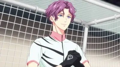 Purple haired soccer player standing in front of a goal net