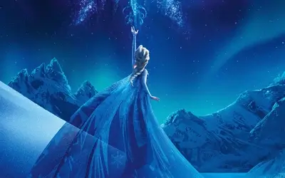 Queen Elsa in snow land raises her left hand in a blue dress