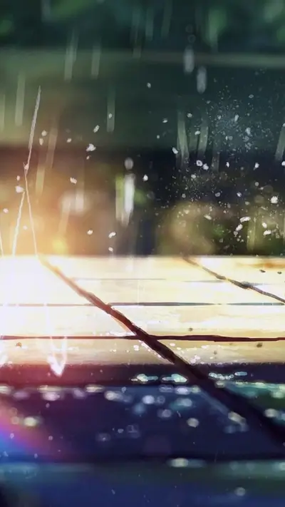 Rain falling on a wooden deck