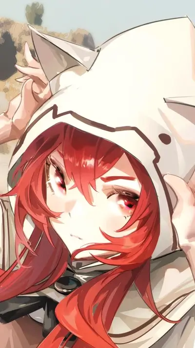 Red-haired girl in a hooded cloak