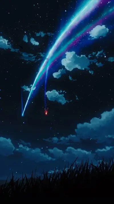 Shooting star streaks across night sky