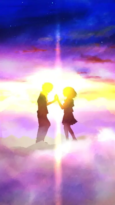 Silhouette of a couple holding hands at sunset