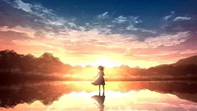 Silhouette of a girl at sunset reflecting in still water
