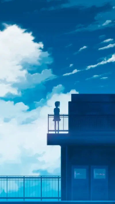 Silhouette of a girl on a balcony overlooking a cloudy sky