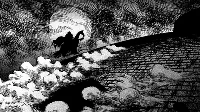 Silhouette of a rider on a horse atop a hill