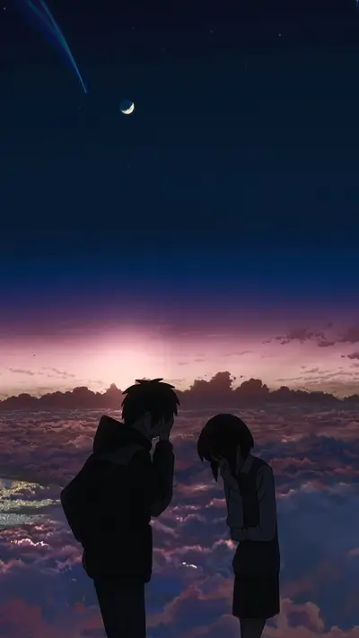 Silhouetted figures overlooking a sea of clouds