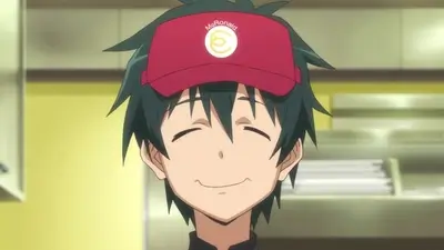 Smiling boy wearing a red fast food visor