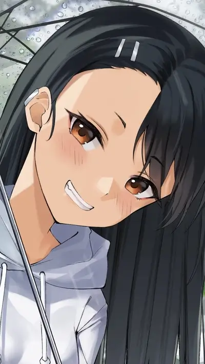 Smiling girl under umbrella in the rain