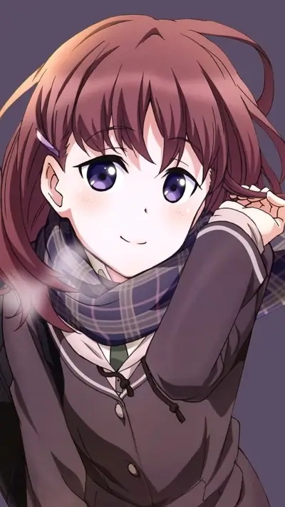 Smiling girl with auburn hair, wearing a scarf and school uniform