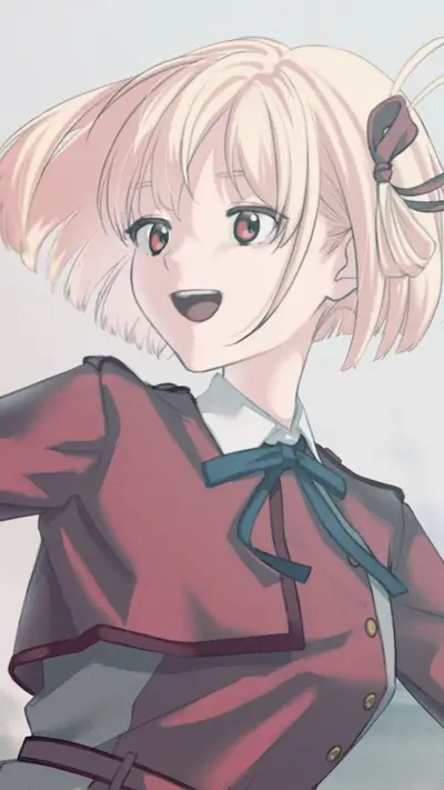 Smiling girl with blonde hair and red jacket