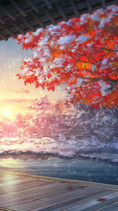 Snow-covered red leaves at sunset near a wooden dock