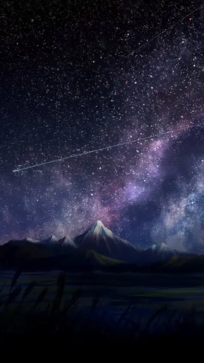 Starry night over snow-capped mountains and tranquil waters