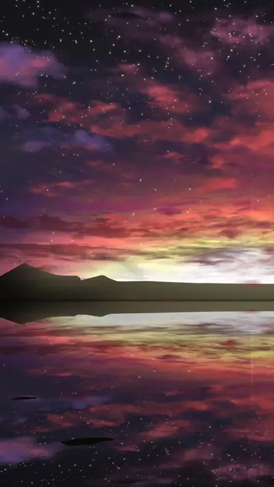 Starry night sky over a calm lake reflecting the colors of the sky