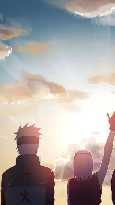 Team looking towards bright sunset, standing side-by-side