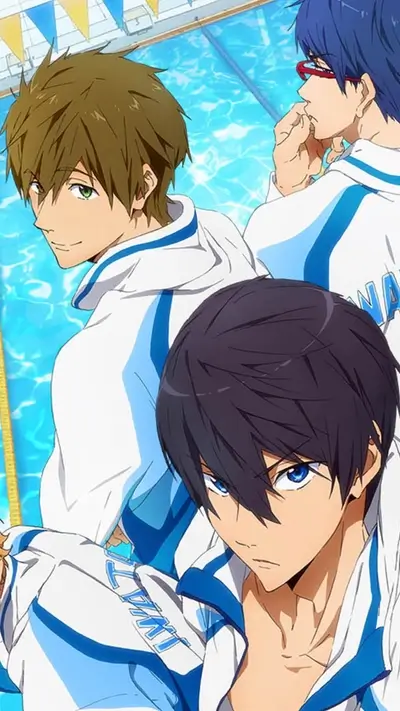Three boys in swim team uniforms by a pool