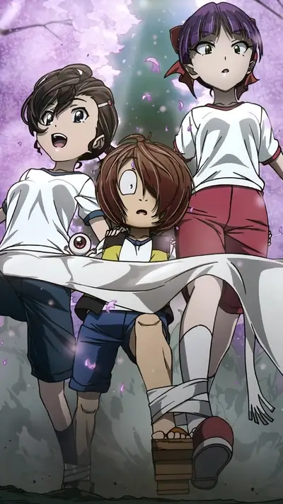 Three girls walking, one carrying a large eye