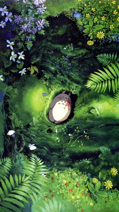 Totoro sleeping peacefully in a lush green forest