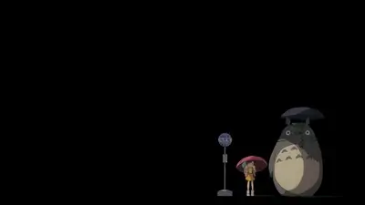 Totoro standing with girls under umbrellas at night bus stop