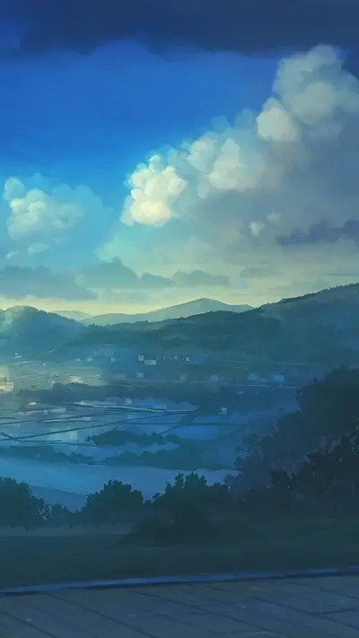 Tranquil countryside view under a partly cloudy sky