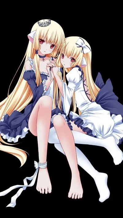 Two blonde twin girls in frilly dresses