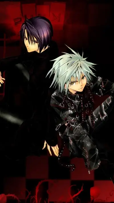 Two boys in dark clothing, red background