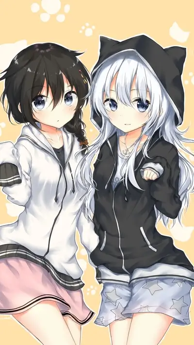 Two cute girls in hoodies