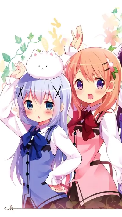 Two cute girls, one with a cat on her head