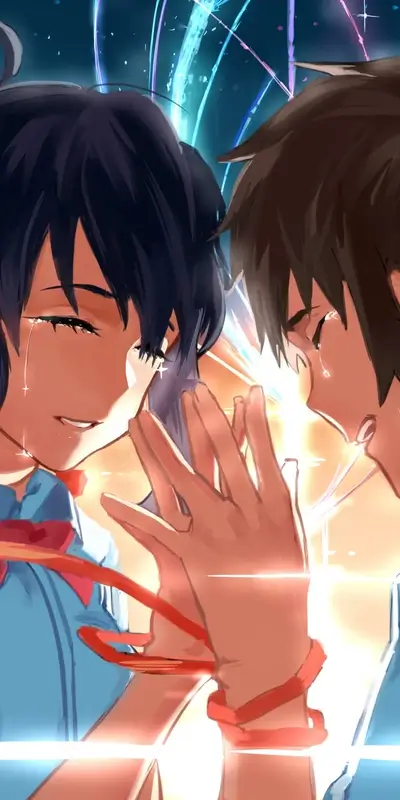 Two figures embrace, tears streaming, radiant light surrounds them
