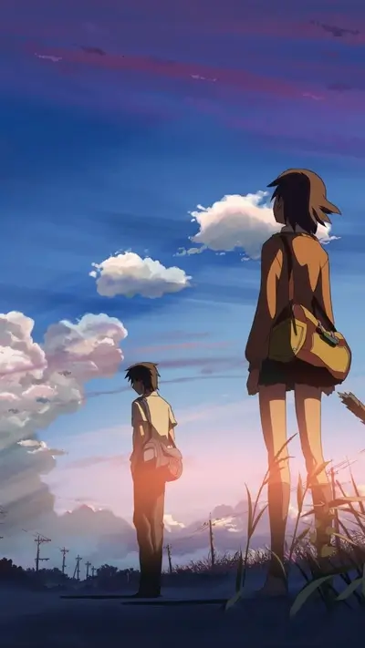 Two figures stand against sky, vibrant hues create atmosphere of reflection and anticipation